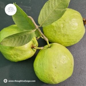 Fresh guava fruit with green leaves.